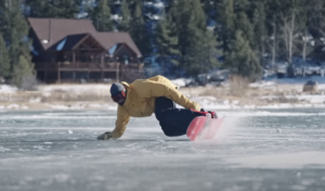 nick larson snowboarding on a frozen lake