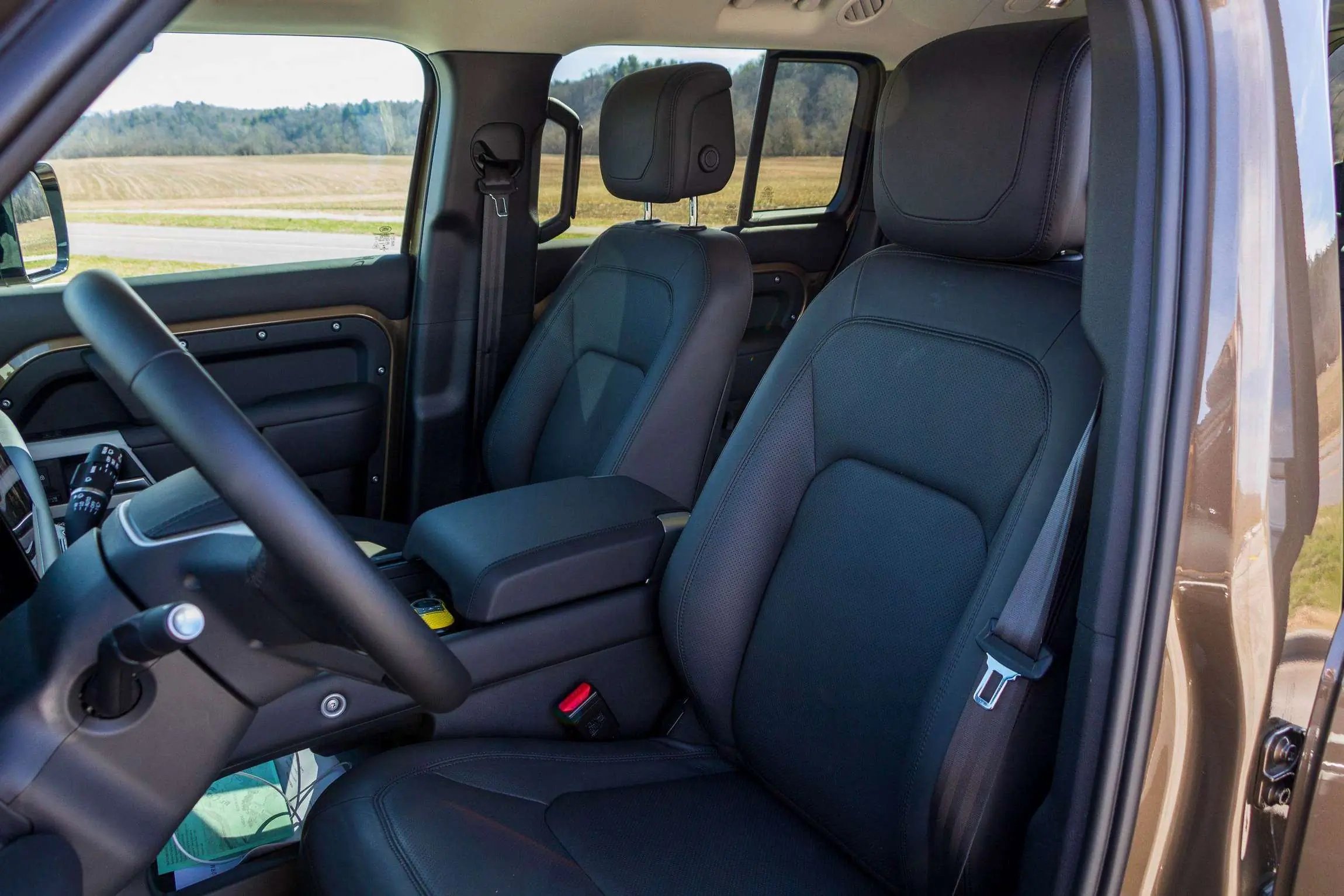 Land Rover Defender 130 Review interior front seats.