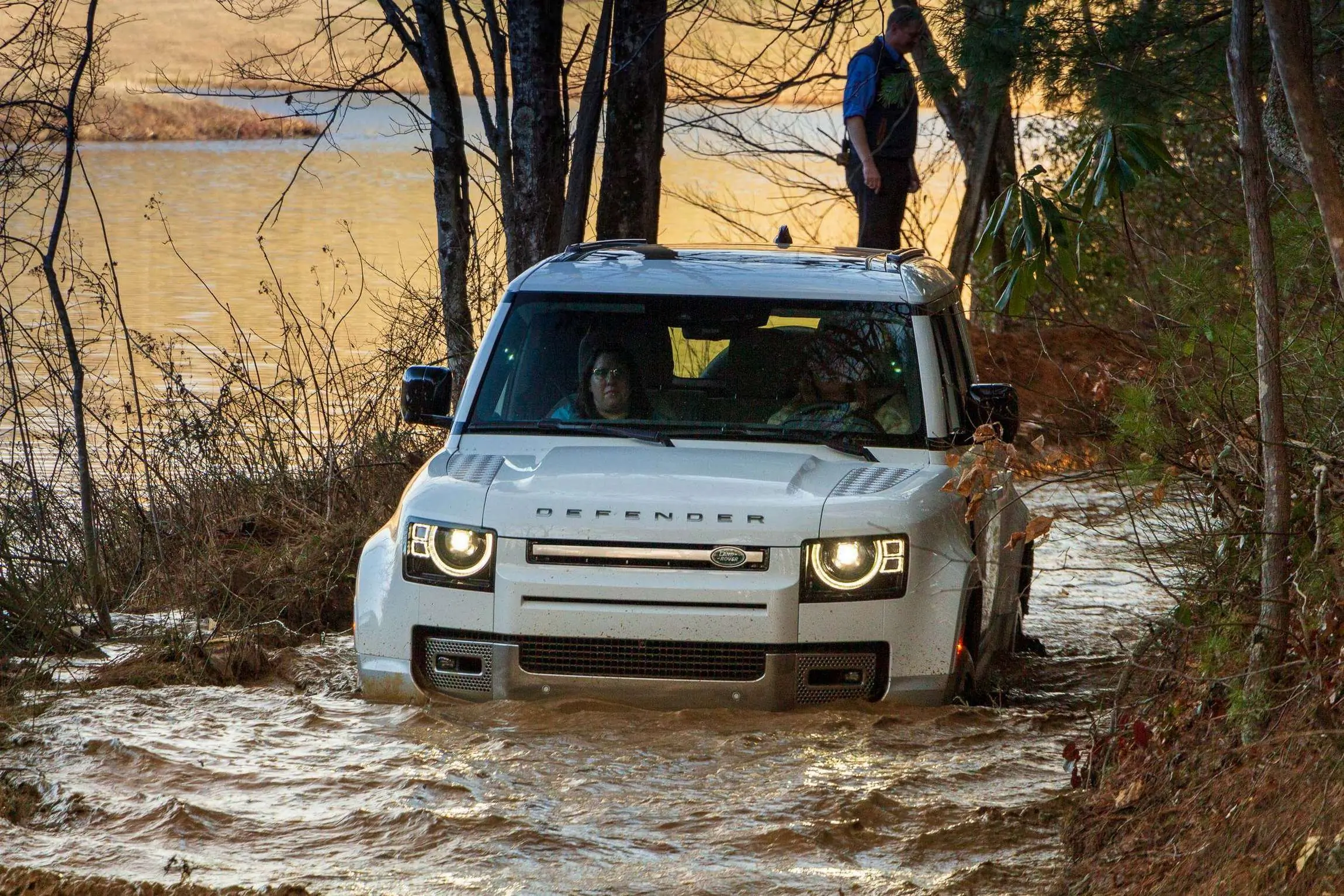 Land Rover Defender 130 Review front in water crossing.