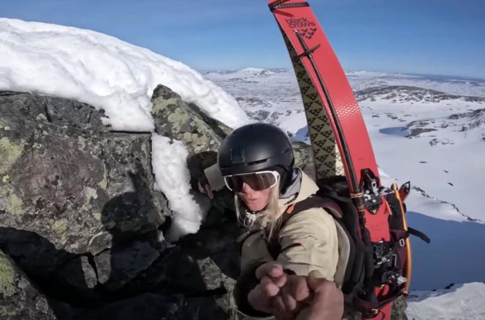 pro skier climbing in Sweden