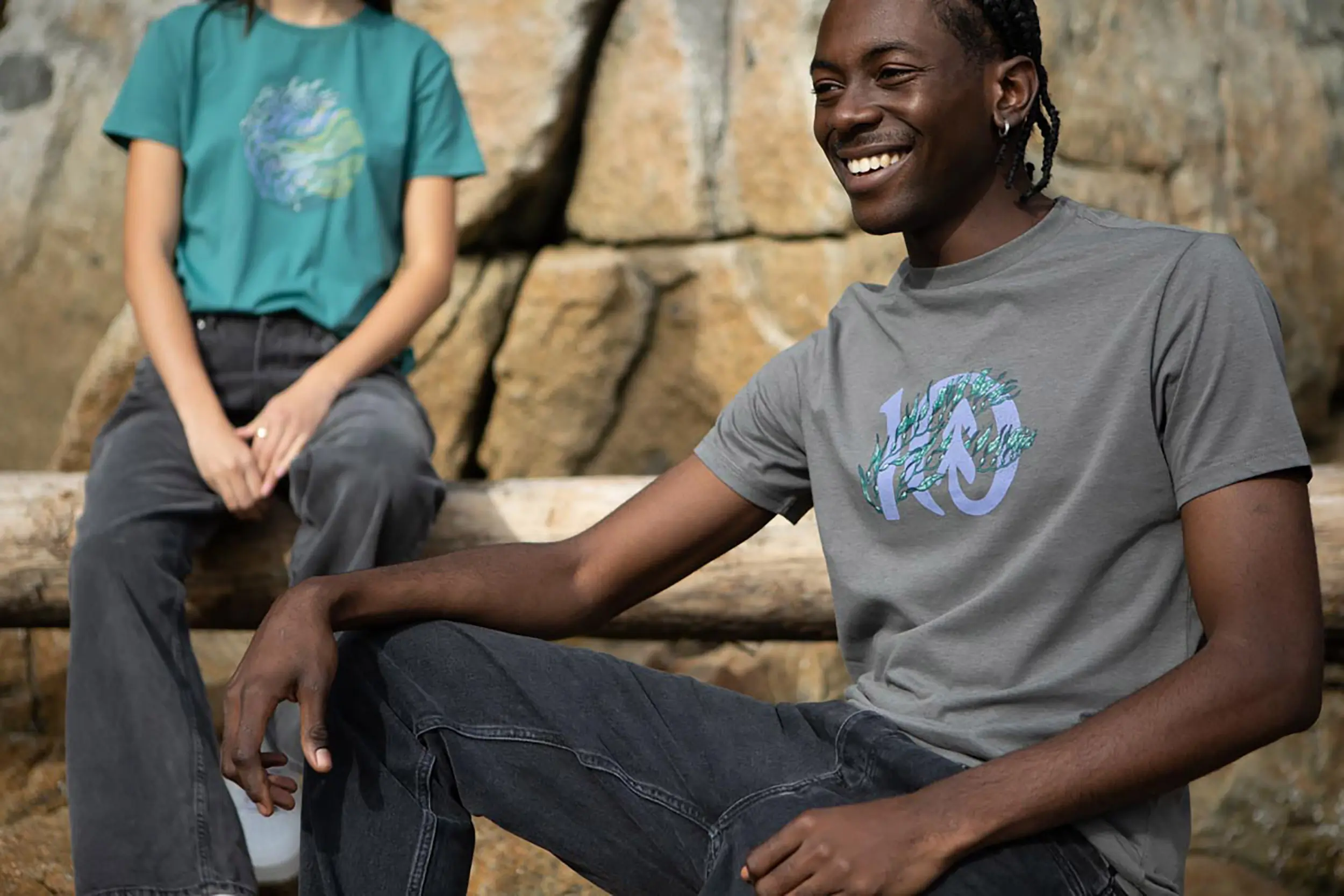 two people wearing tentree apparel 