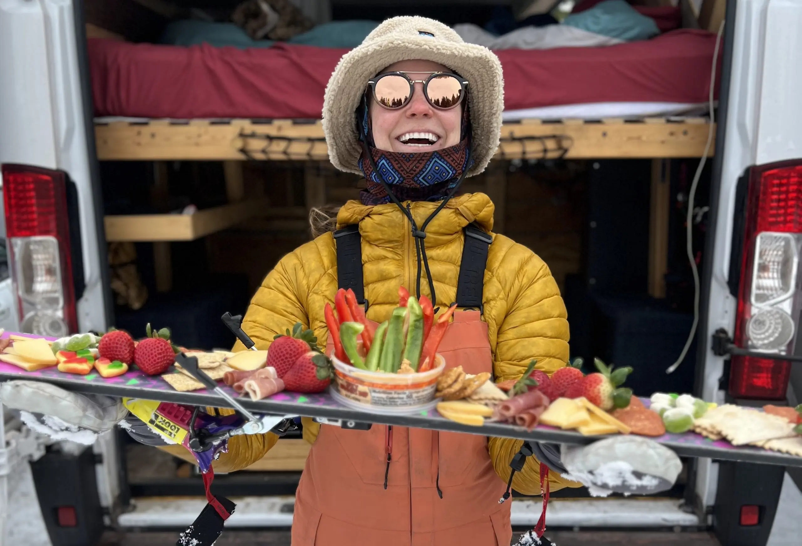 a person holding snacks on a ski