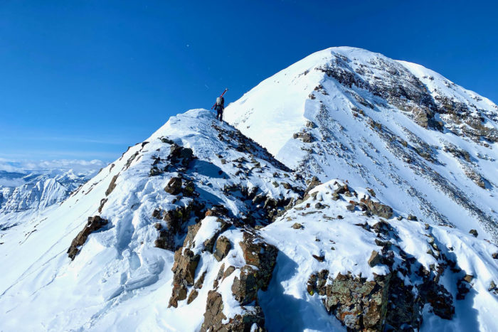 Chris Fischer climbs a ridgeline in Colorado 