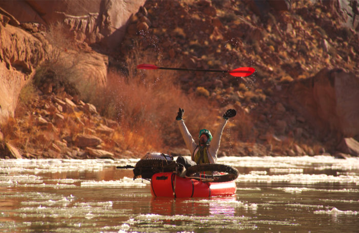 Alpacka Packrafts' new "Ready to Ship" program throwing paddle in air over canoe