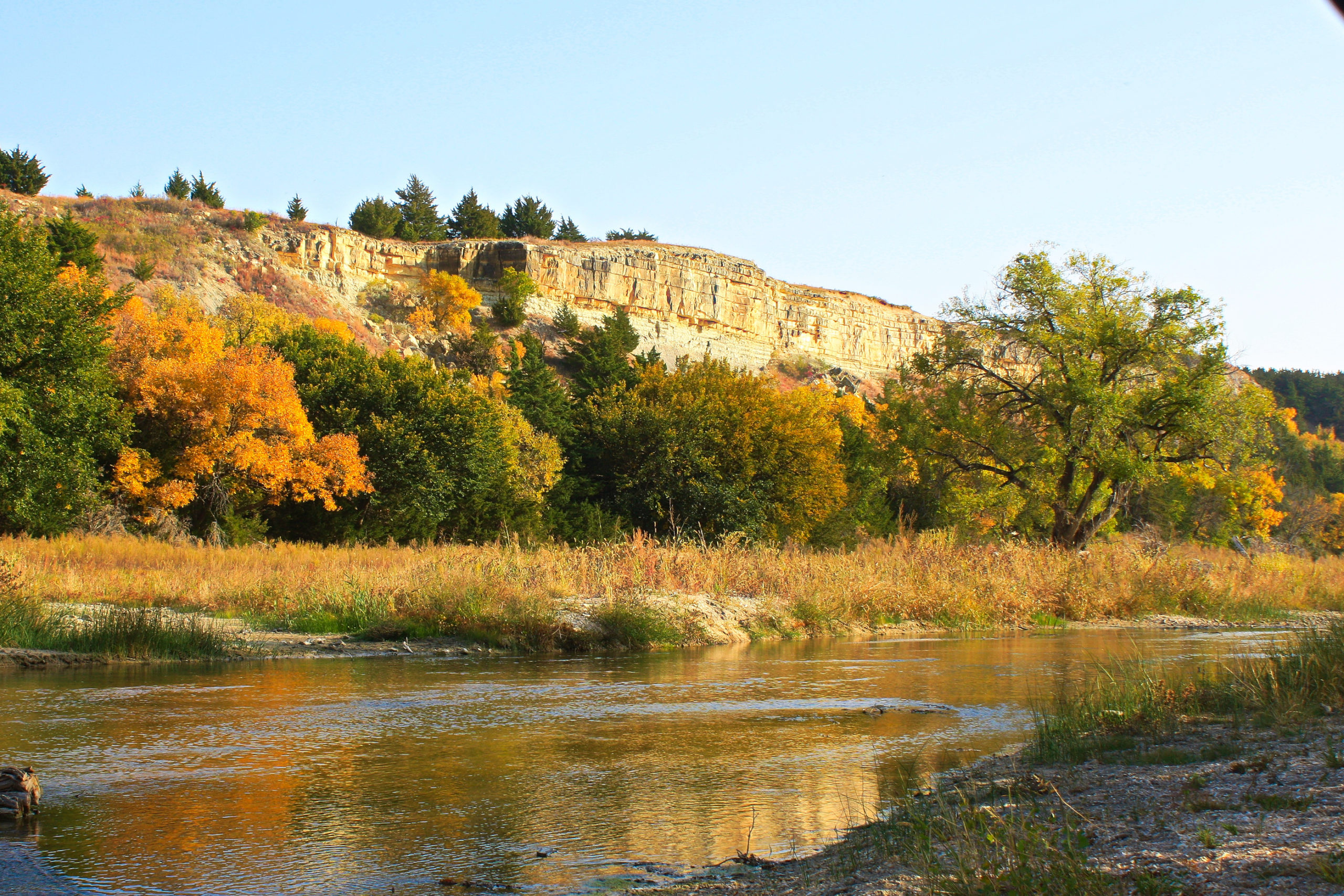 A river flowing through some bluffs in Kansas.