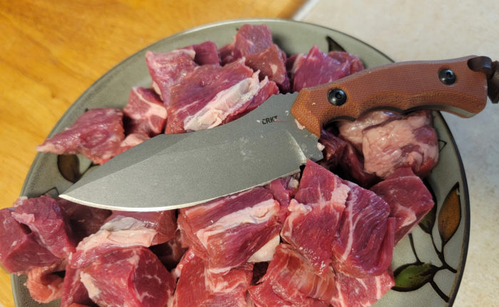 Cutting meat with the CRKT Bugsy