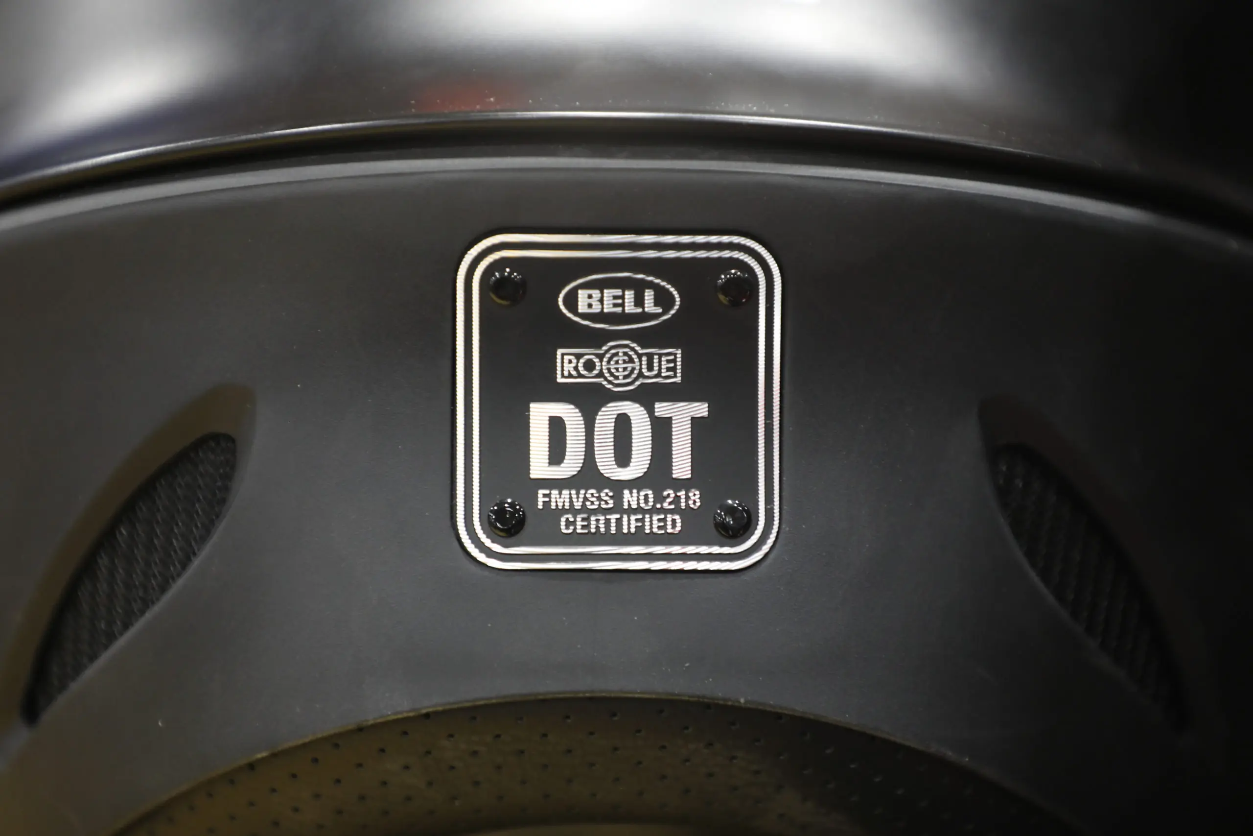 Motorcycle helmet DOT certification stamp close-up