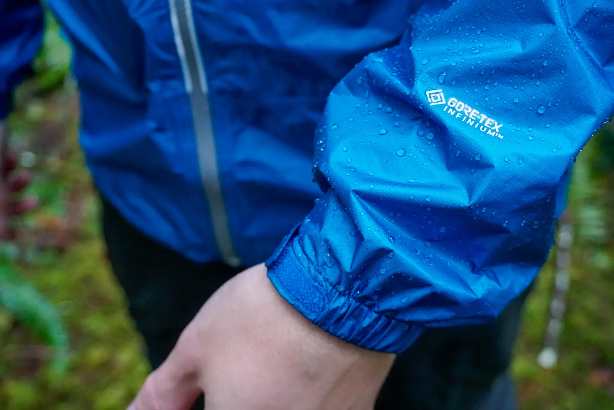Hiker Wearing the Mont Bell Versalite Rain Jacket