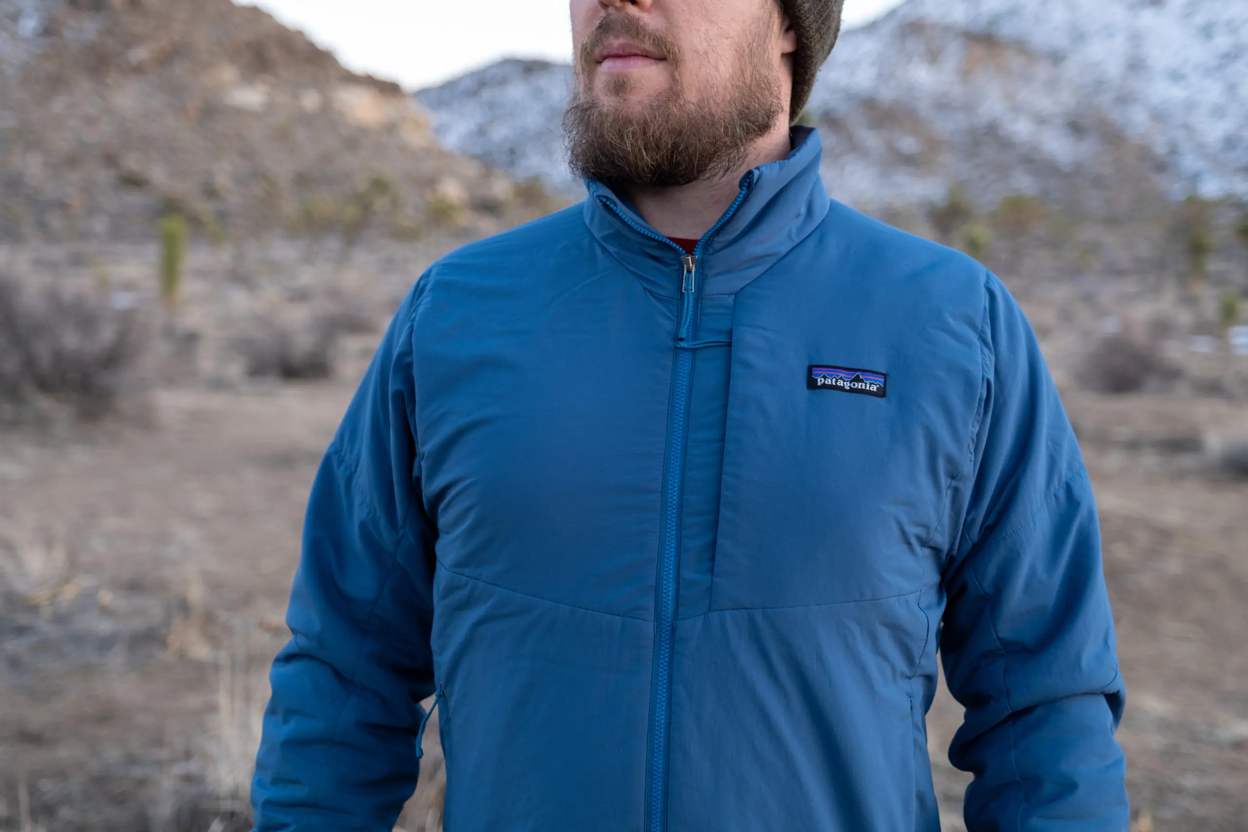 Guy wearing a Patagonia Nano Air Jacket Favorite Van Life Gear