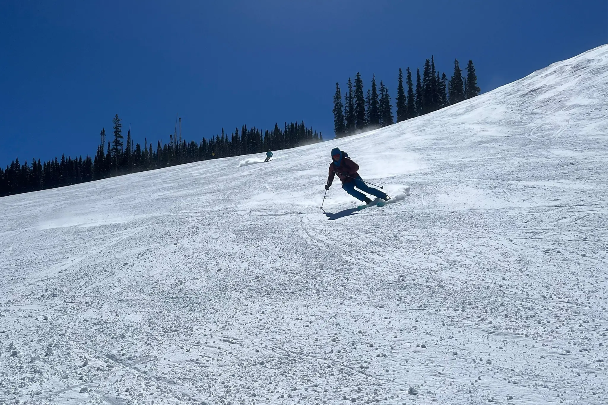 Skier descending a mountain