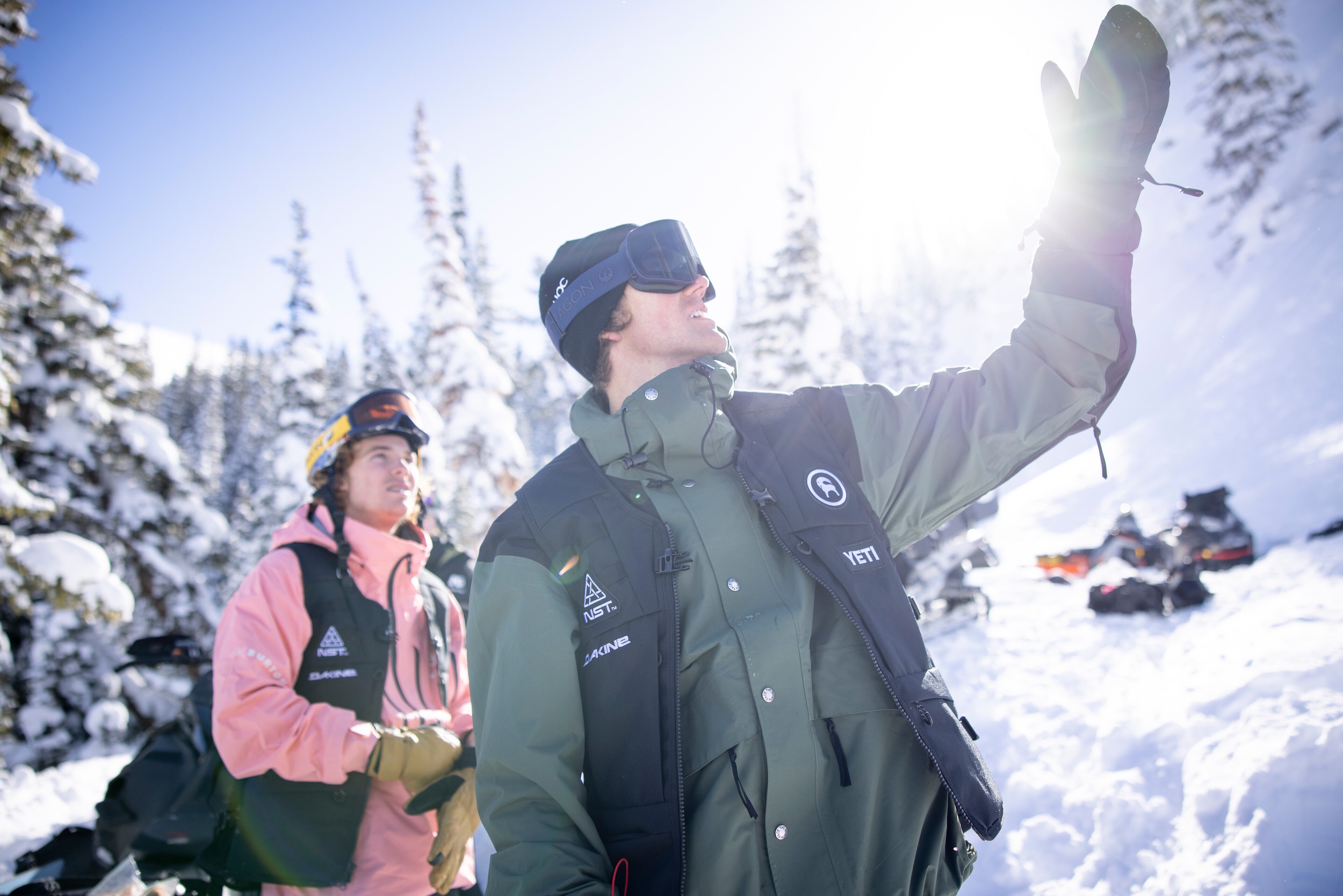 two snowboarders on the slopes