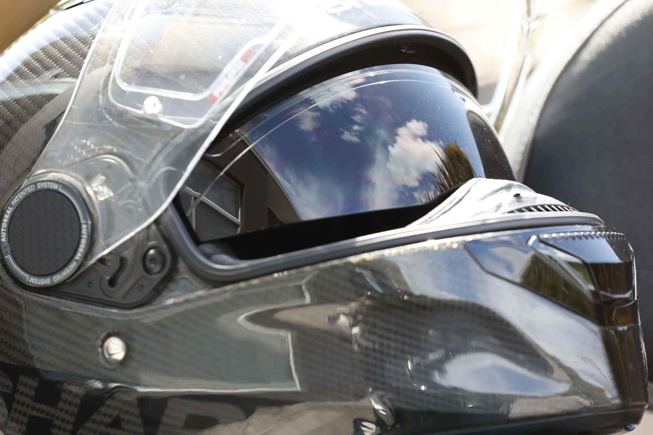 Motorcycle helmet sun visor