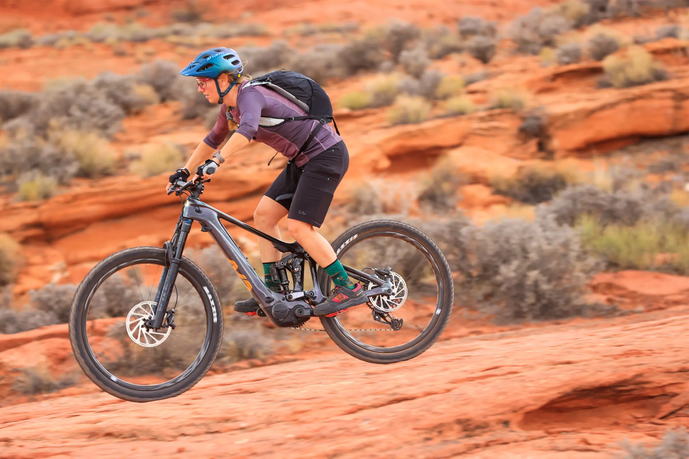 Liv Intrigue X Advanced E+ Elite at speed woman riding