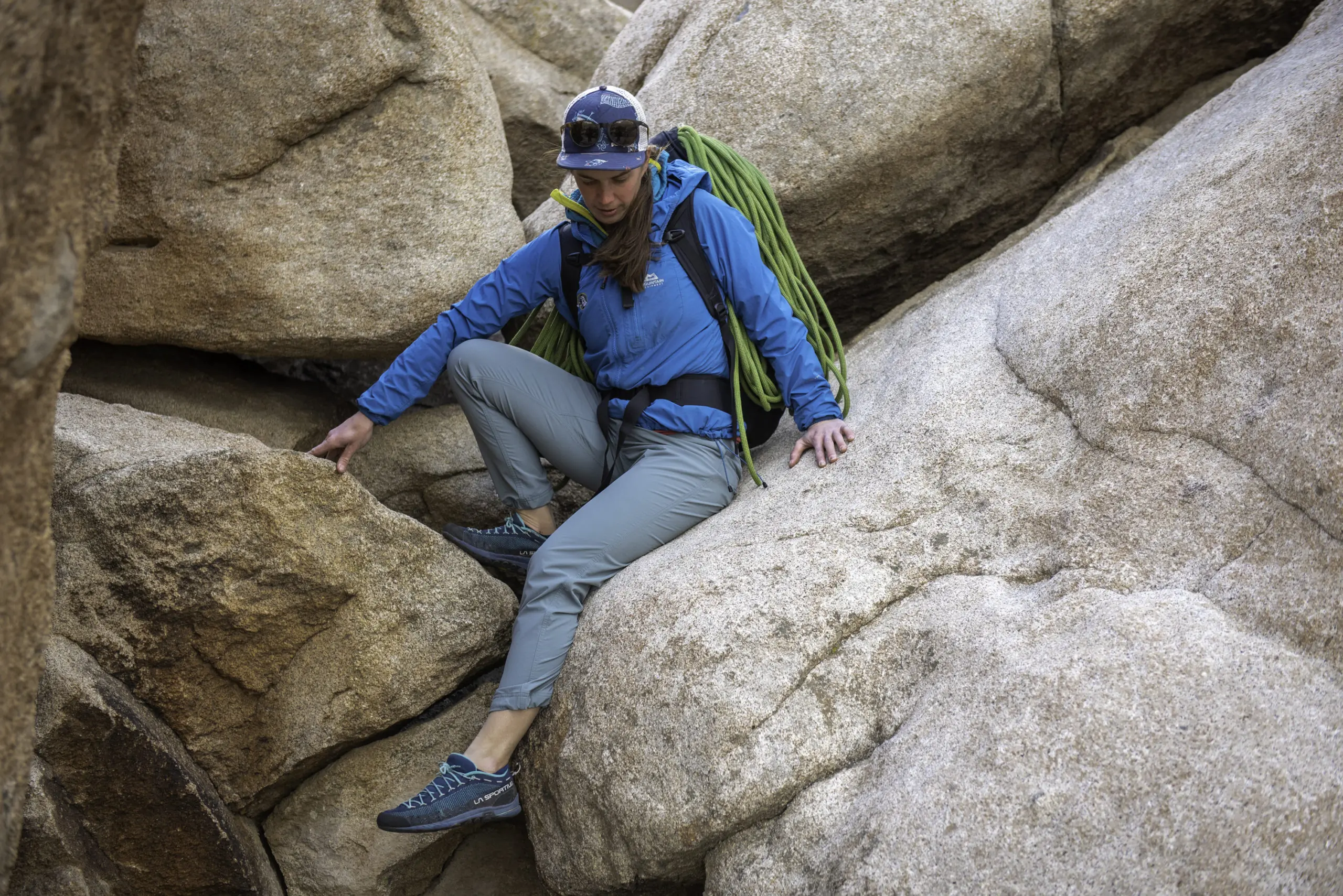 A Climber Scrambles in Joshua Tree National Park Wearing the Topo Designs Women's Boulder Pants