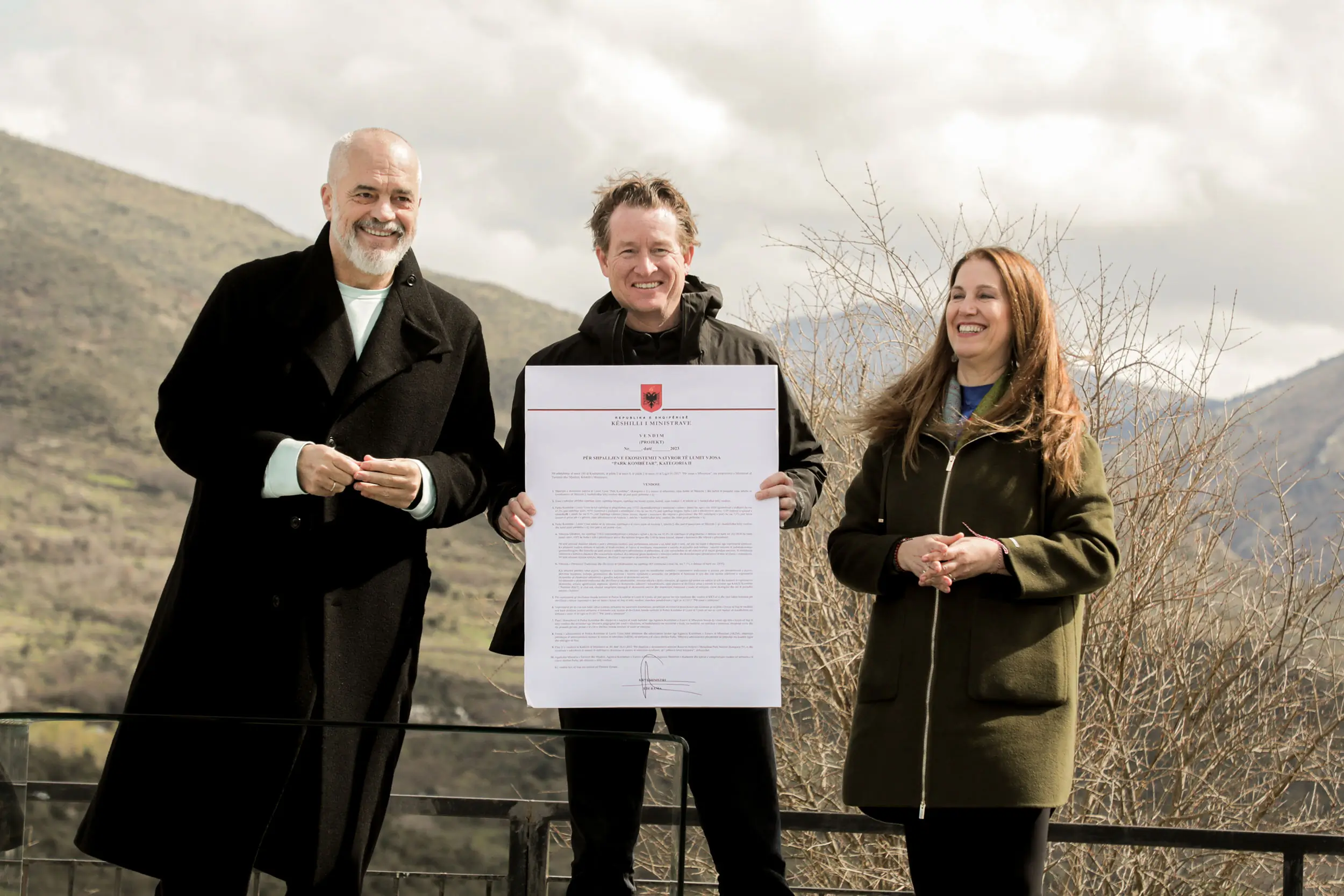 From left to right: Albanian Prime Minister Edi Rama, Patagonia CEO Ryan Gellert, and  Minister of Tourism and Environment Mirela Kumbaro Furxhi. Gellert, in center, is holding the proclamation. 