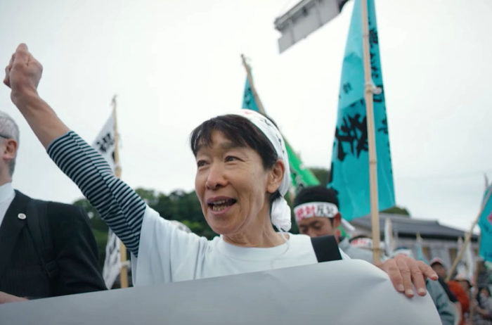 a woman at an environmental demonstration