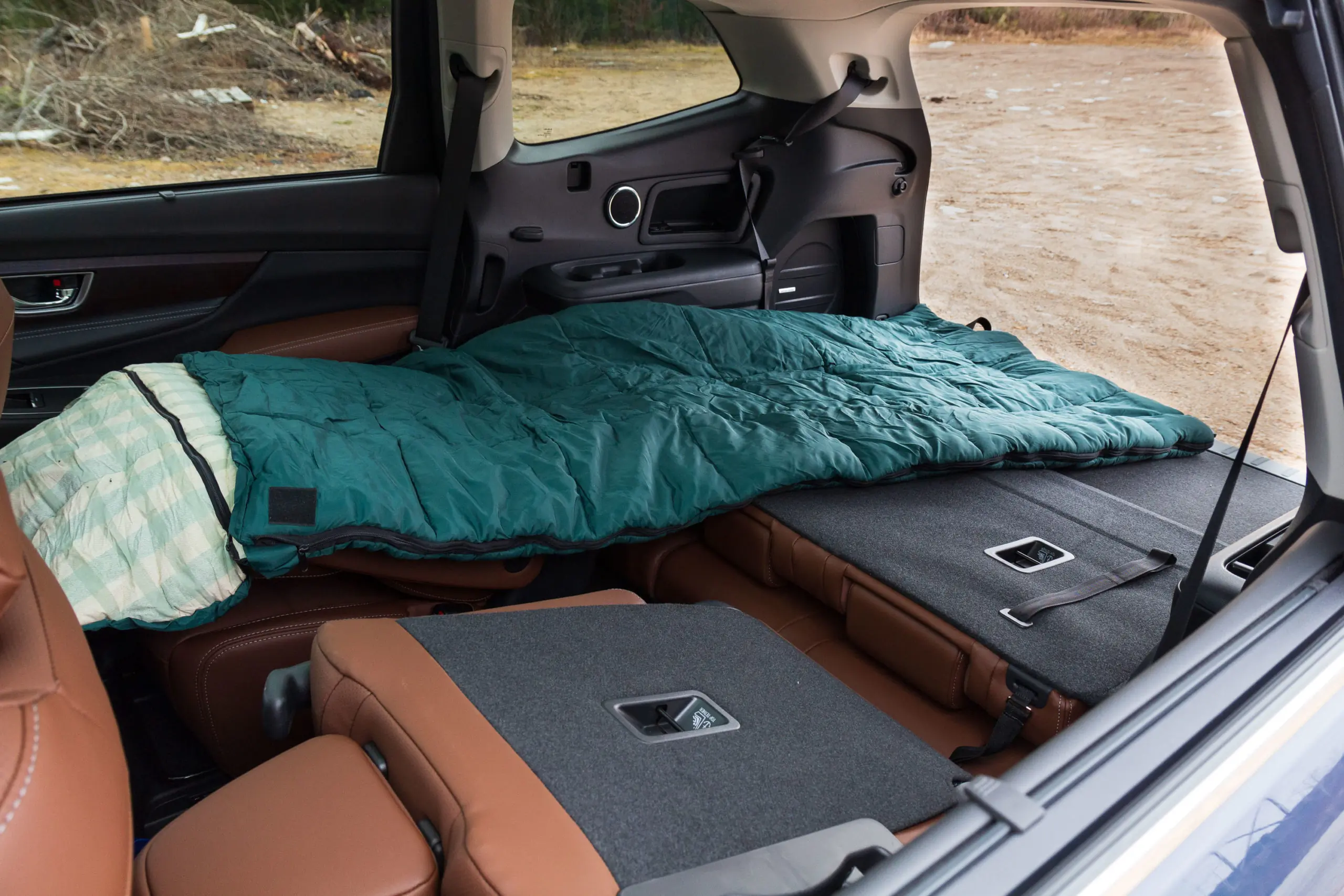2023 Subaru Ascent Review rear seats folded down with sleeping bag