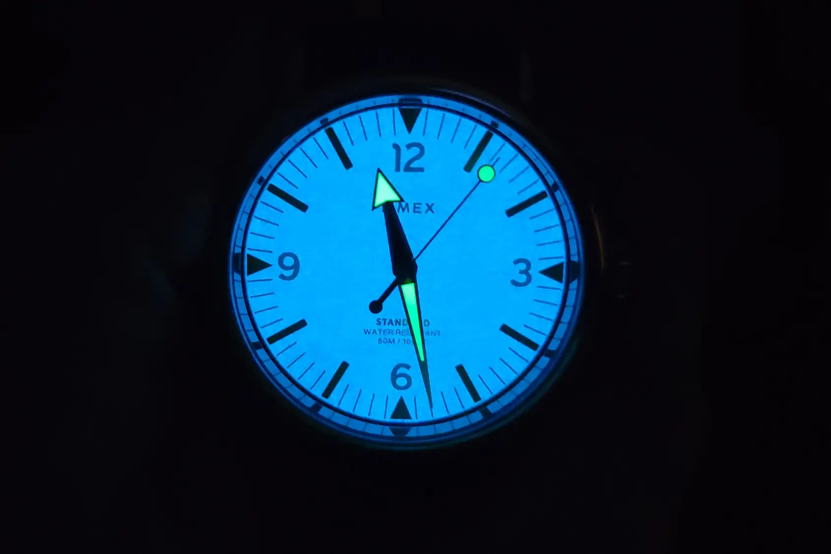 Timex Standard Watch Closeup in dark showing Indiglo
