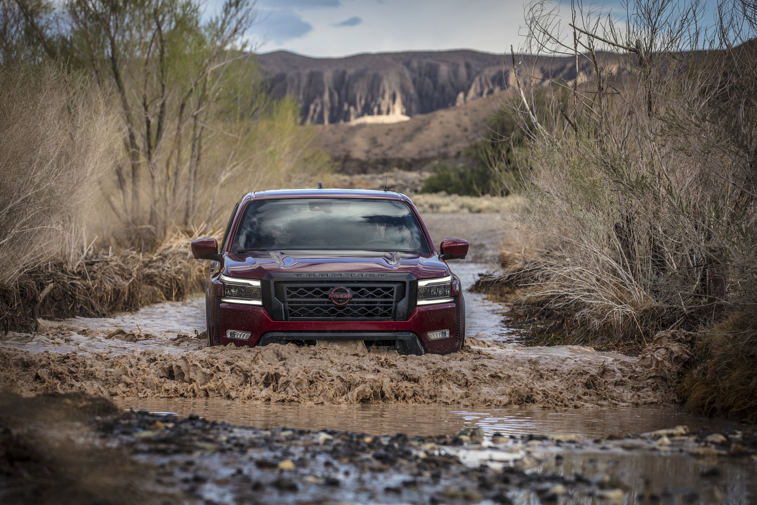Nissan Frontier pro-4x wading across the mojave river
