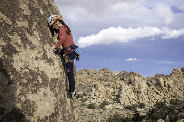 A Climber Negotiates a Slab Climb in Joshua Tree National Park Wearing the Arc'teryx Gamma Pants