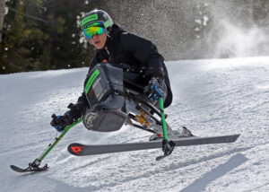 adaptive skier going down a hill