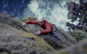 jesse dufton climbing a sea cliff
