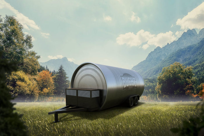 an 3D rendering of a can-shaped camper in a field