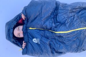 Editor Mary murphy in the sierra designs sleeping bag