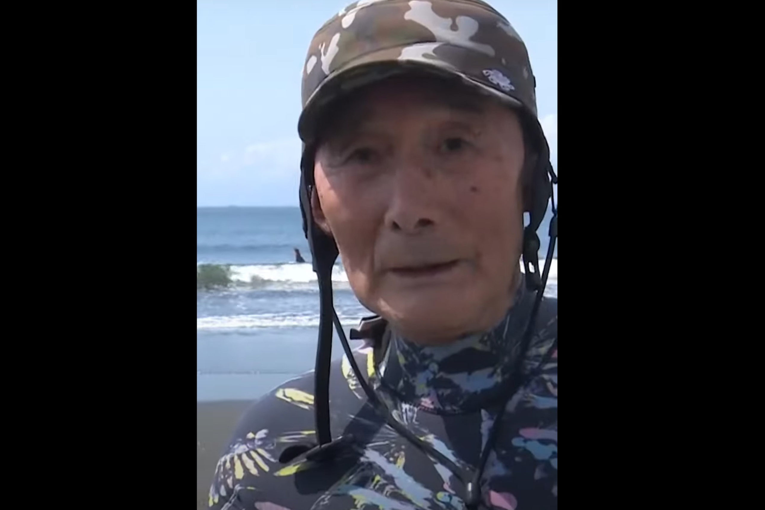 a screenshot of Seiichi Sano at the beach