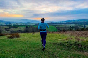 Woman running on grass