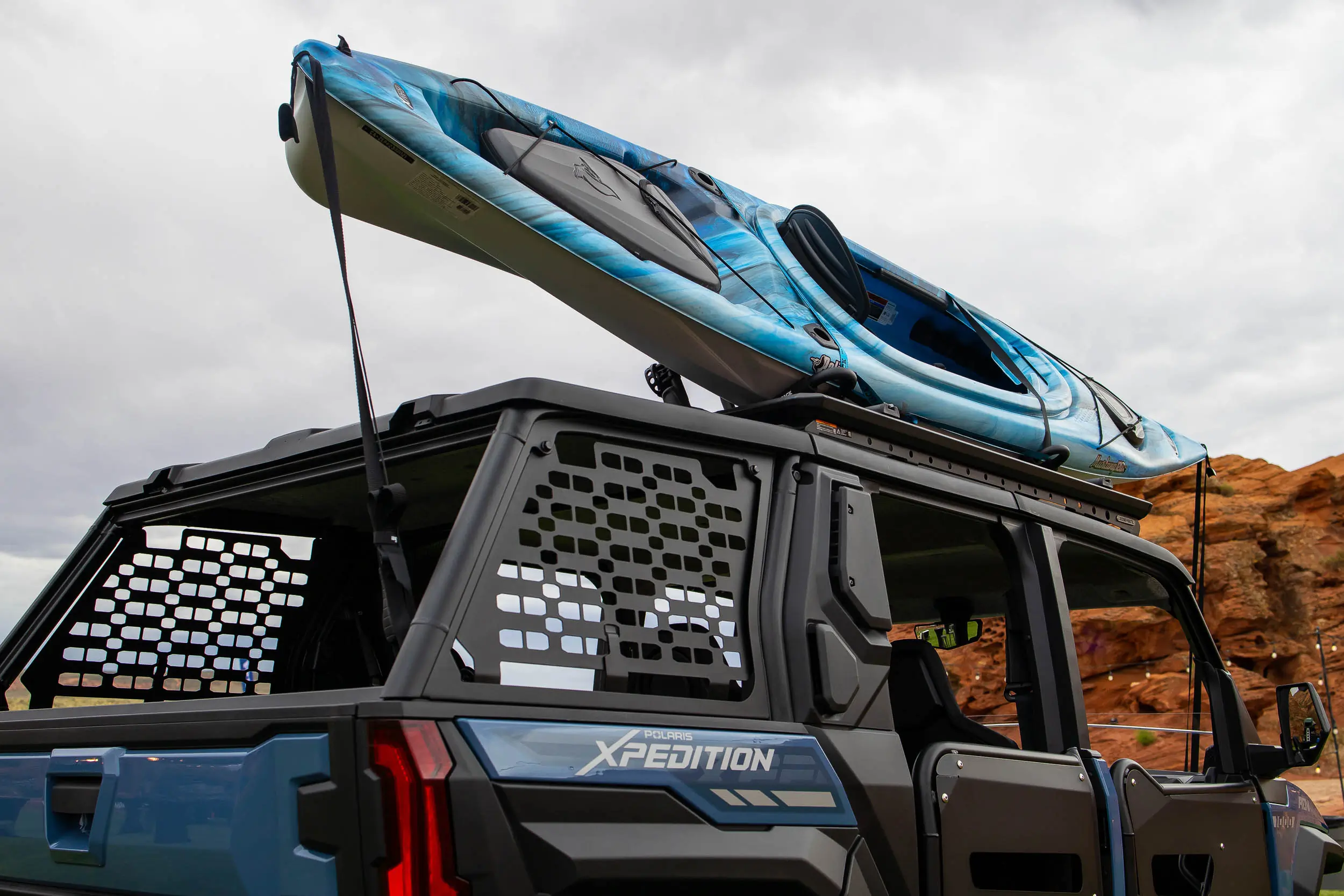 kayak mounted on Polaris XPEDITION Rhino-Rack roof rack