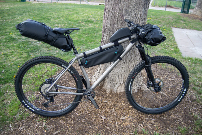Osprey Escapist collection on a mountain bike