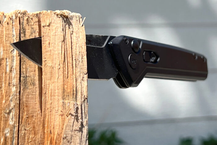 Buck Deploy Blackout Pro batoning through wood