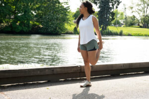Women stretching with running shorts