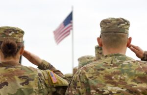 american soldiers salute the flag