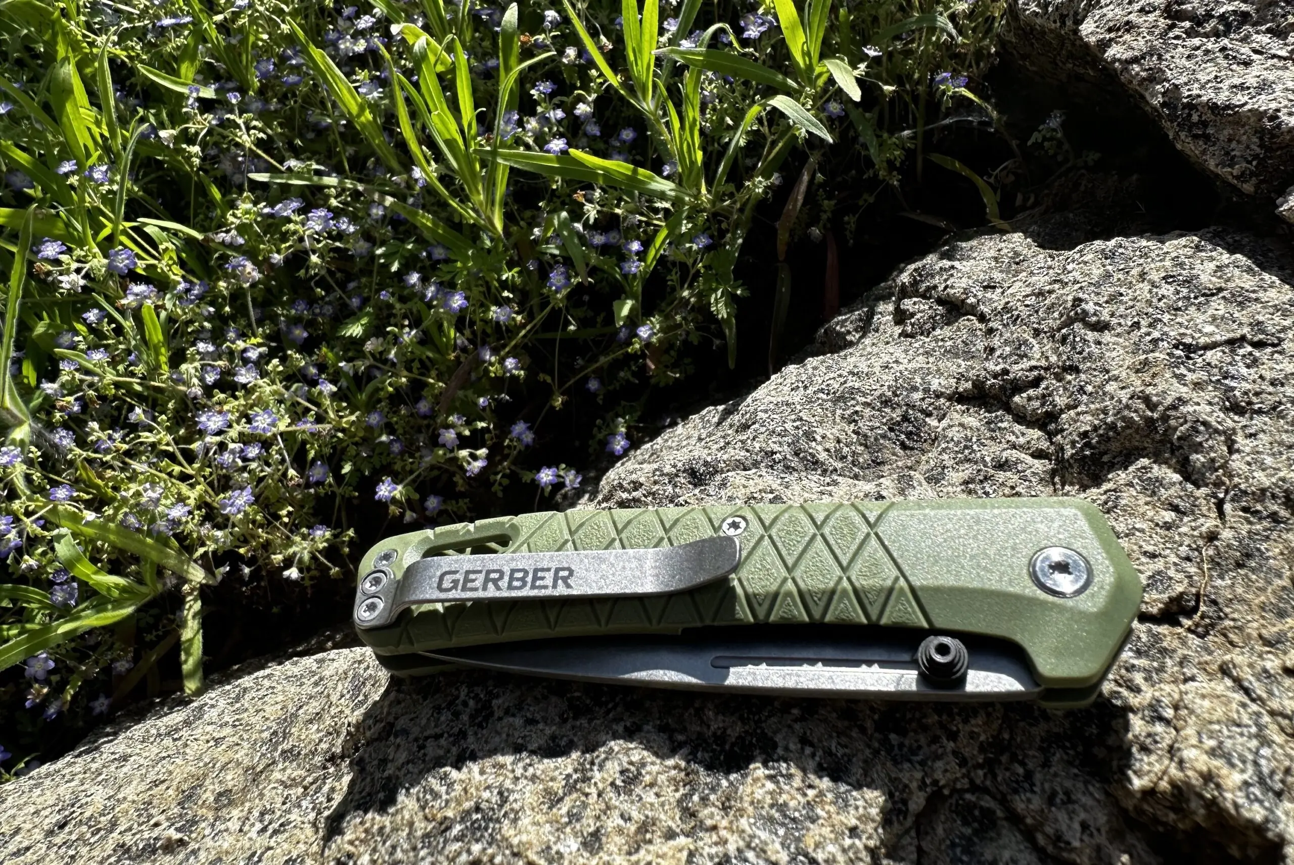 gerber gear zilch knife on a rock outside