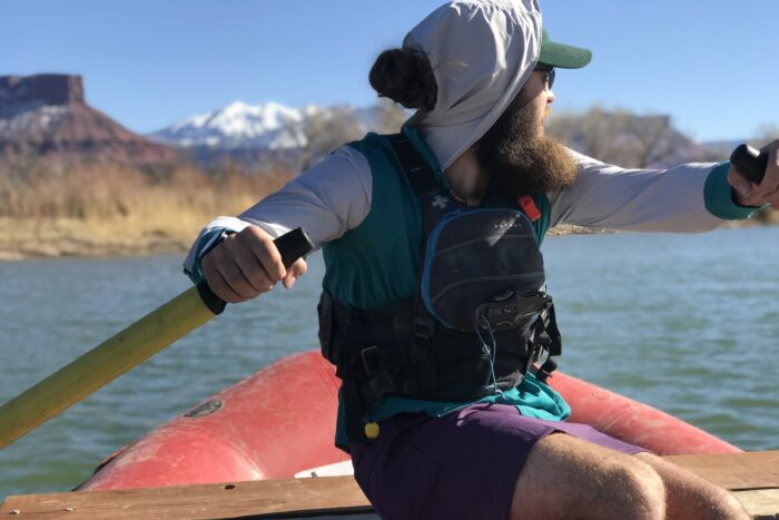 Jolly in his hand sewn prototype shirt on the Colorado River in Moab, Utah, 2020.