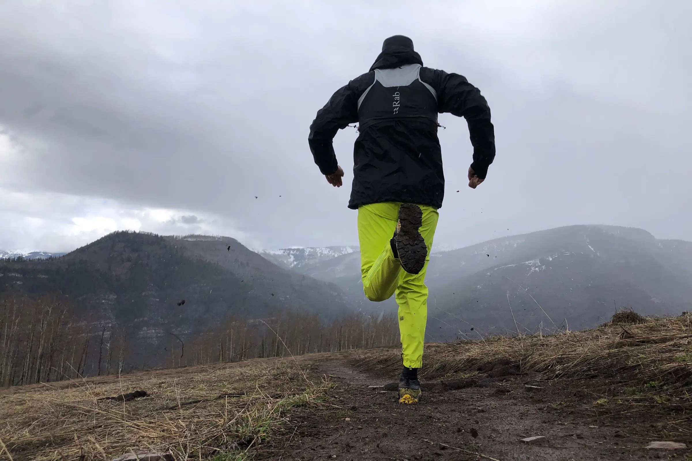 Rab Veil 6L Vest with a rain jacket