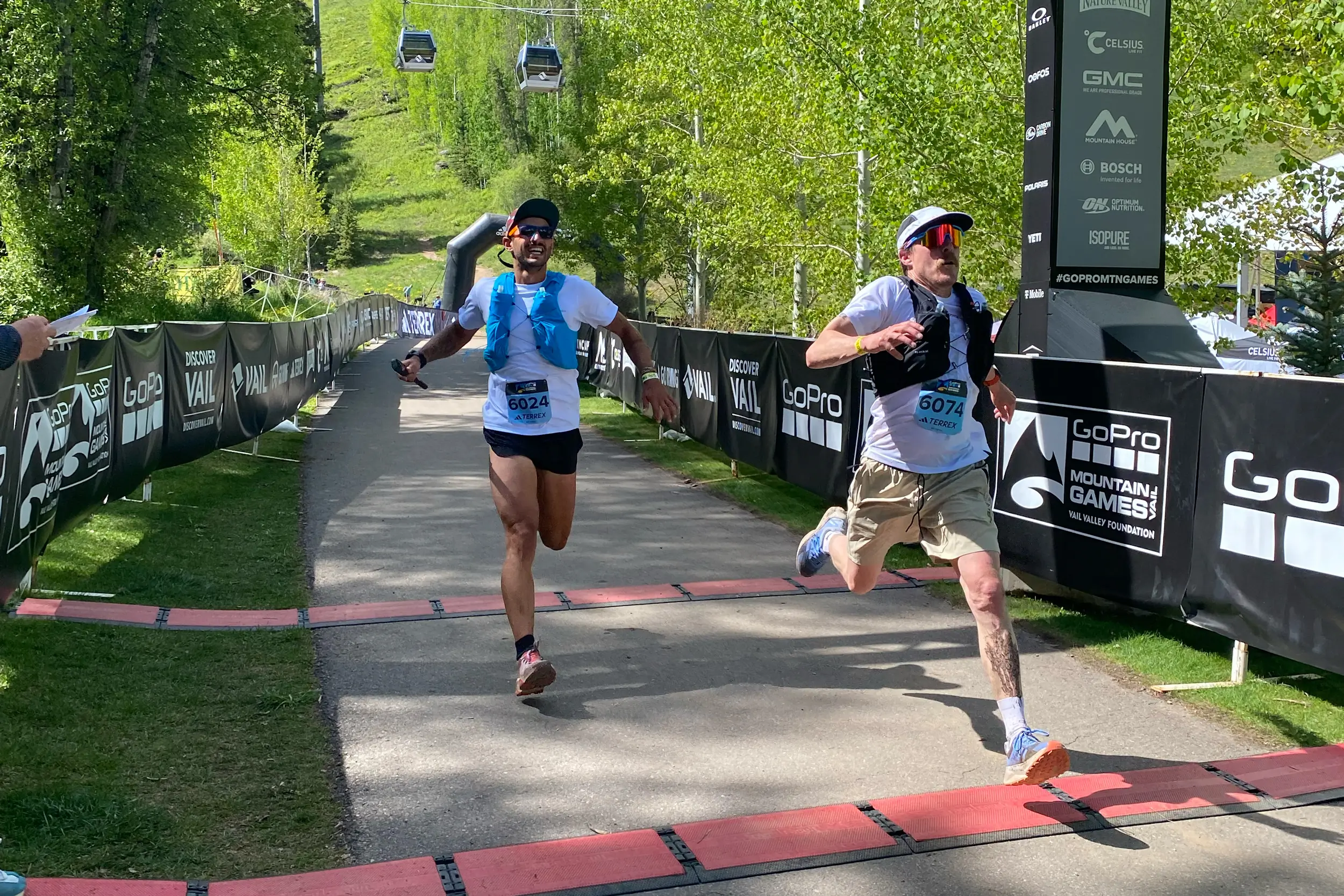 The author bounds across the finish line at the adidas Terrex trail run at the GoPro Mountain Games 2023