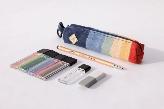 The With colored pencil set on a white background