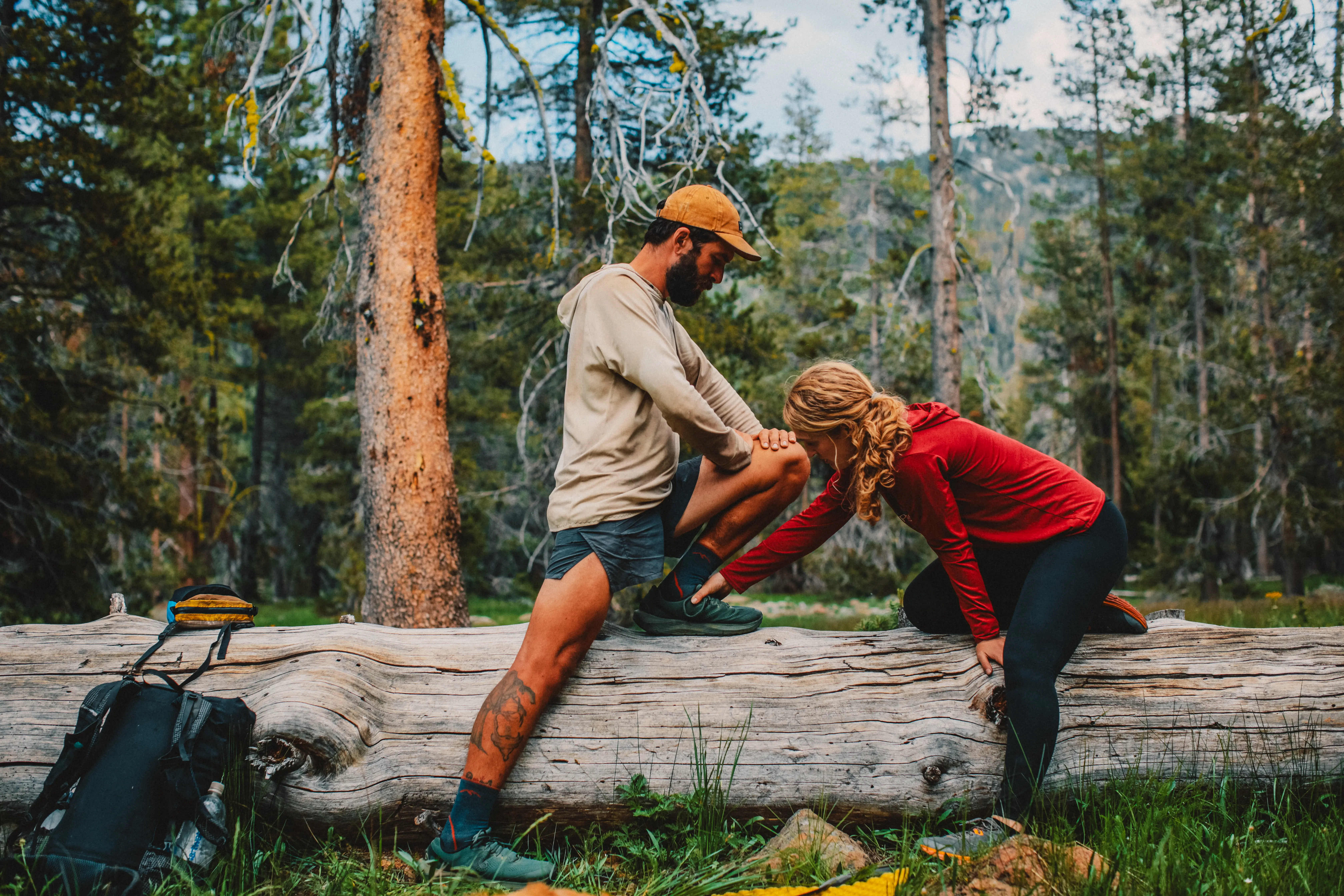 Blaze Physio and her assistant honey help a thru-hikers with hiking injuries