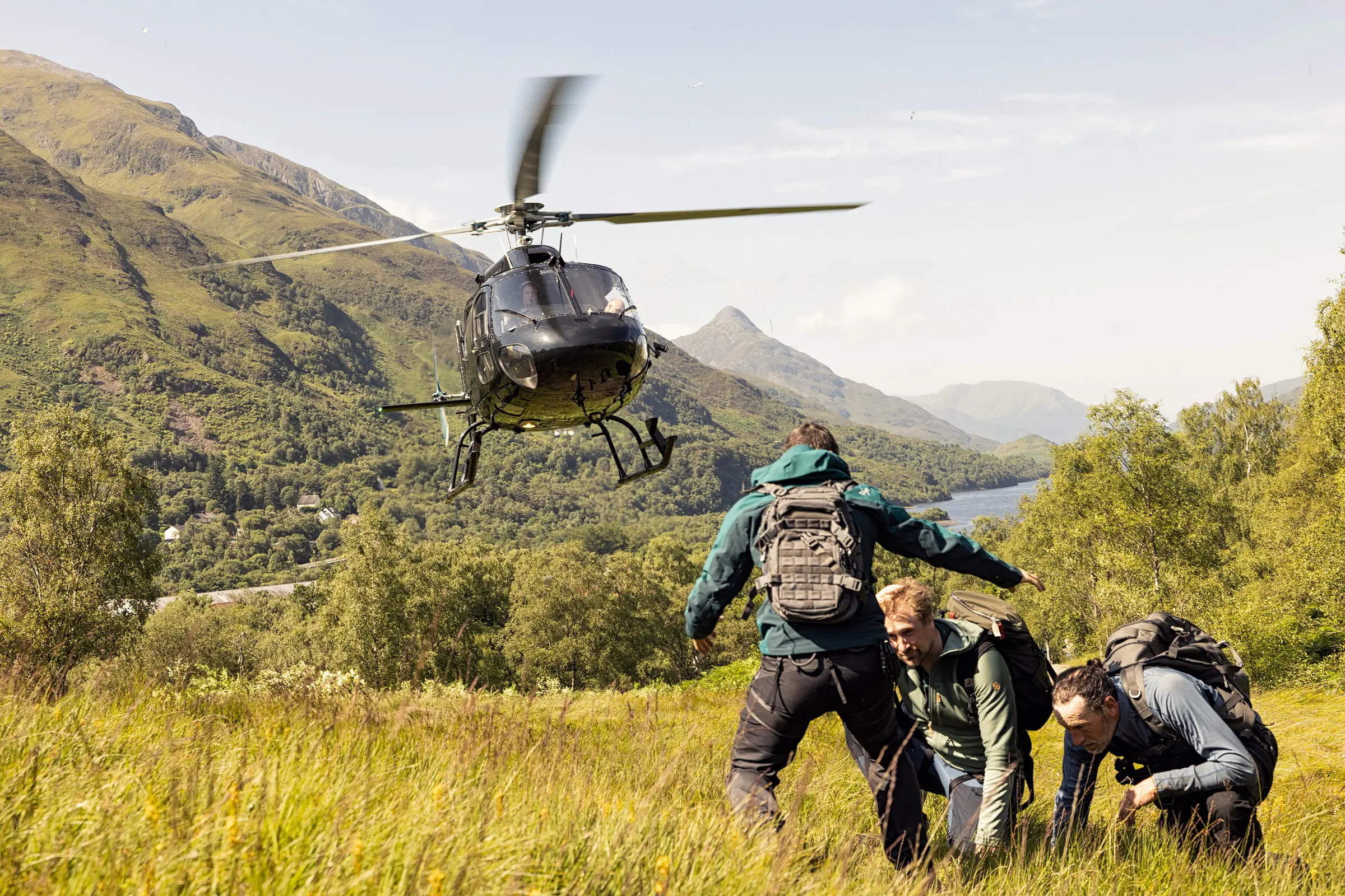 Grylls, ASL interpreter Justin Mauer and Troy Kotsur get dropped off via helicopter.
