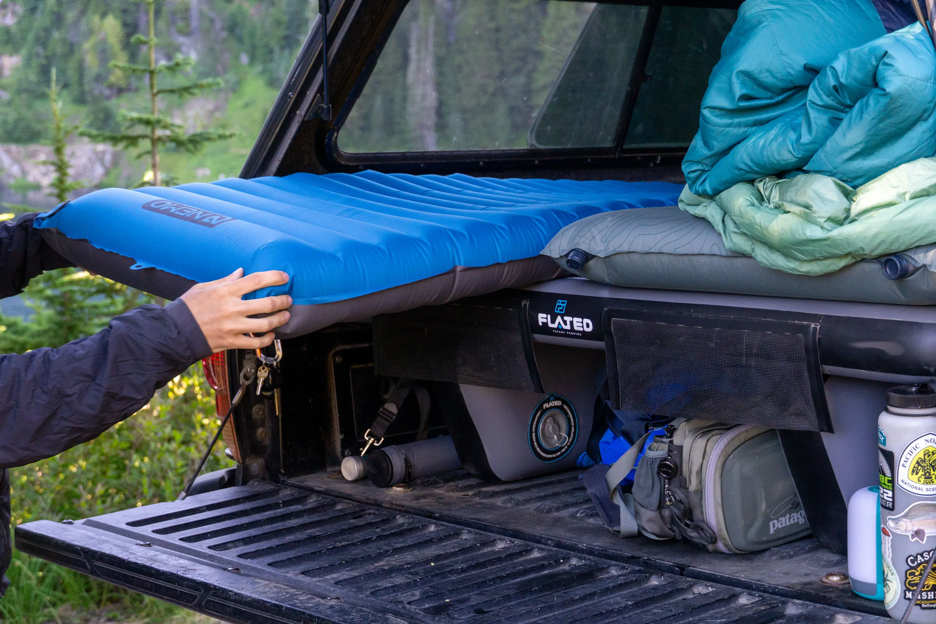 FLATED Air-Deck with Inflatable Mattresses on top in Back of Toyota Tacoma