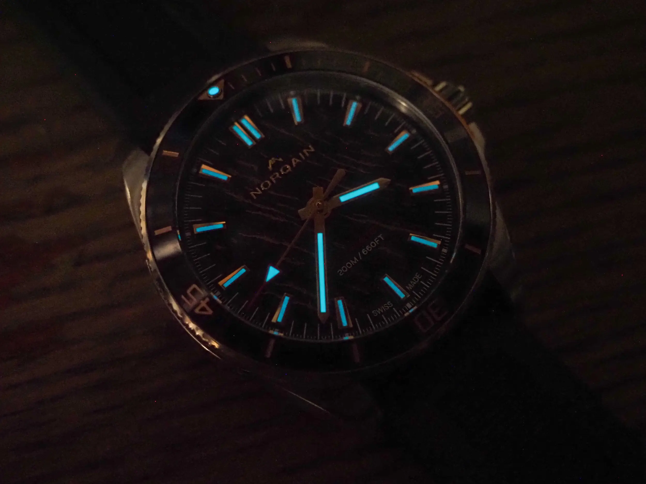 The NORQAIN Neverest Glacier watch lume