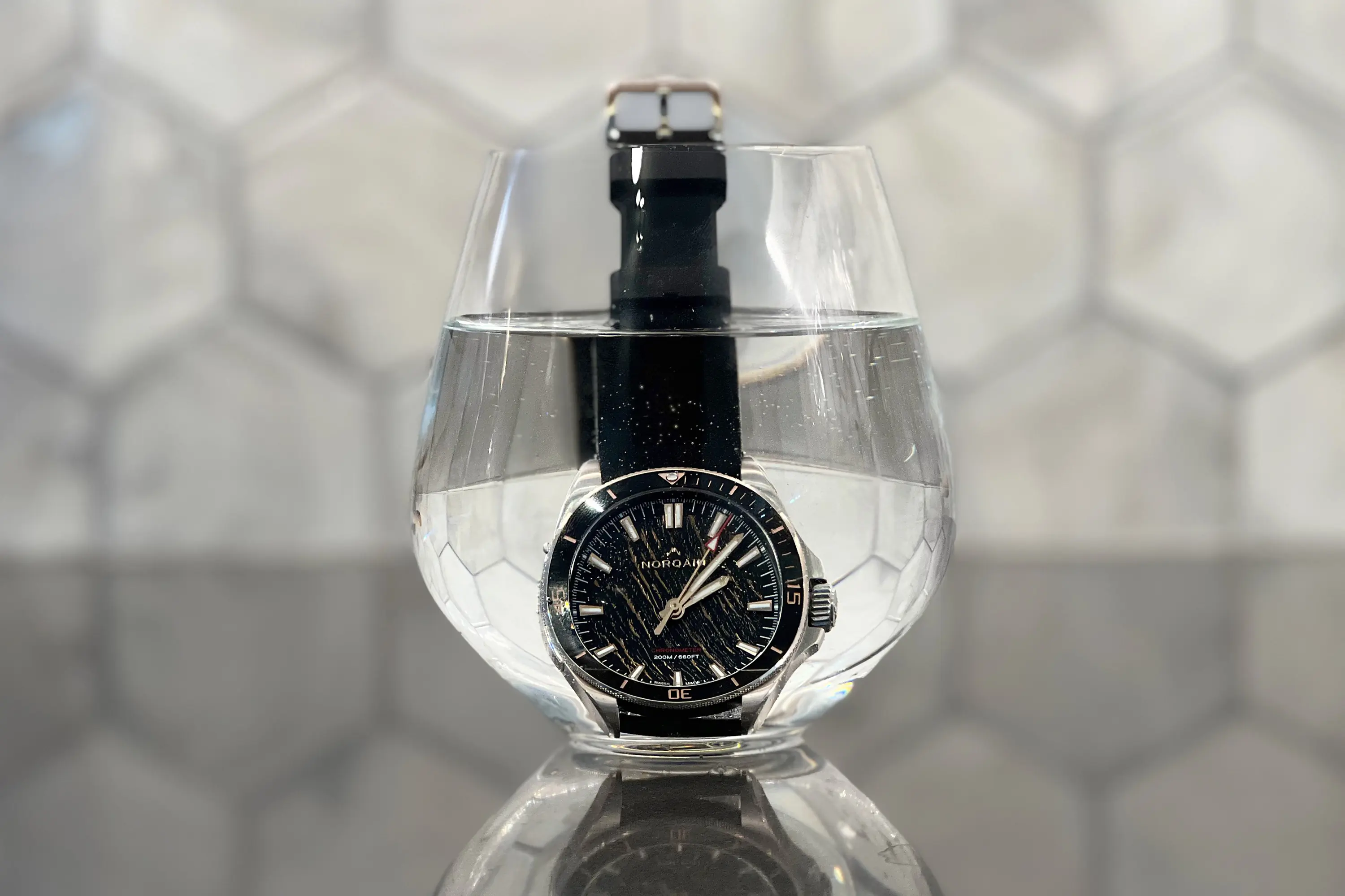 The NORQAIN Neverest Glacier watch in water