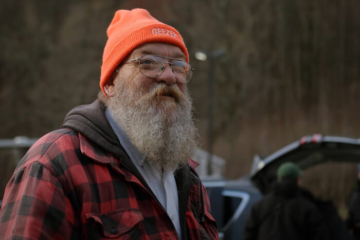a man in an orange cap