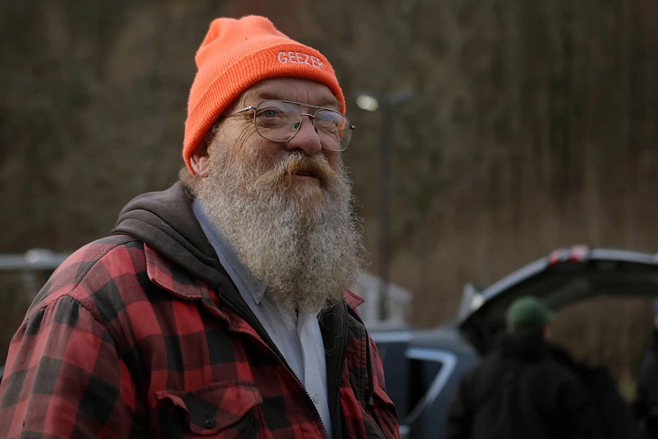 a man in an orange cap