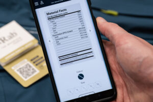 a hand holding a phone