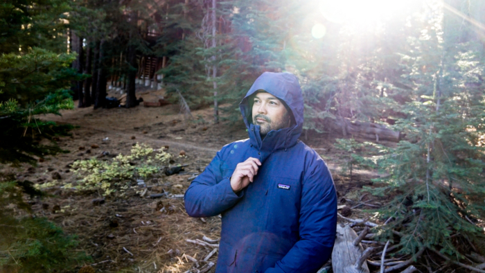 A man models the Patagonia Tres 3-in-1 Parka.