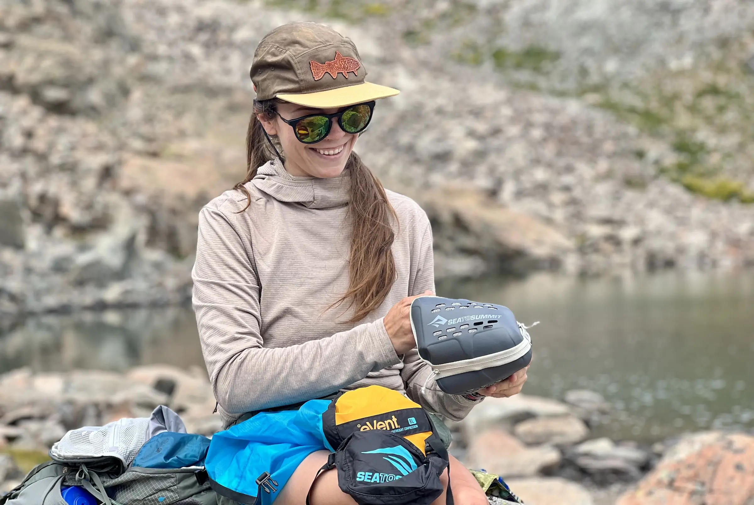 Shelby Mann packs up her compressible Evac Dry Bag. 